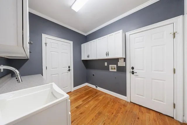 a bathroom with a bathtub and a sink