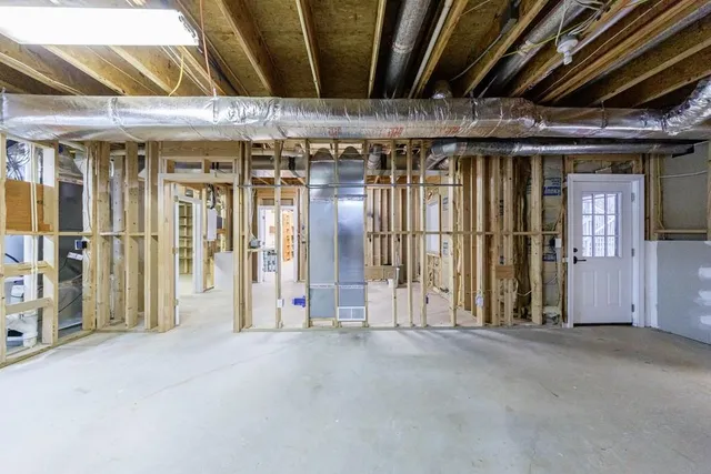 a view of a room with wooden walls