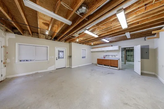 a backyard with table and chairs