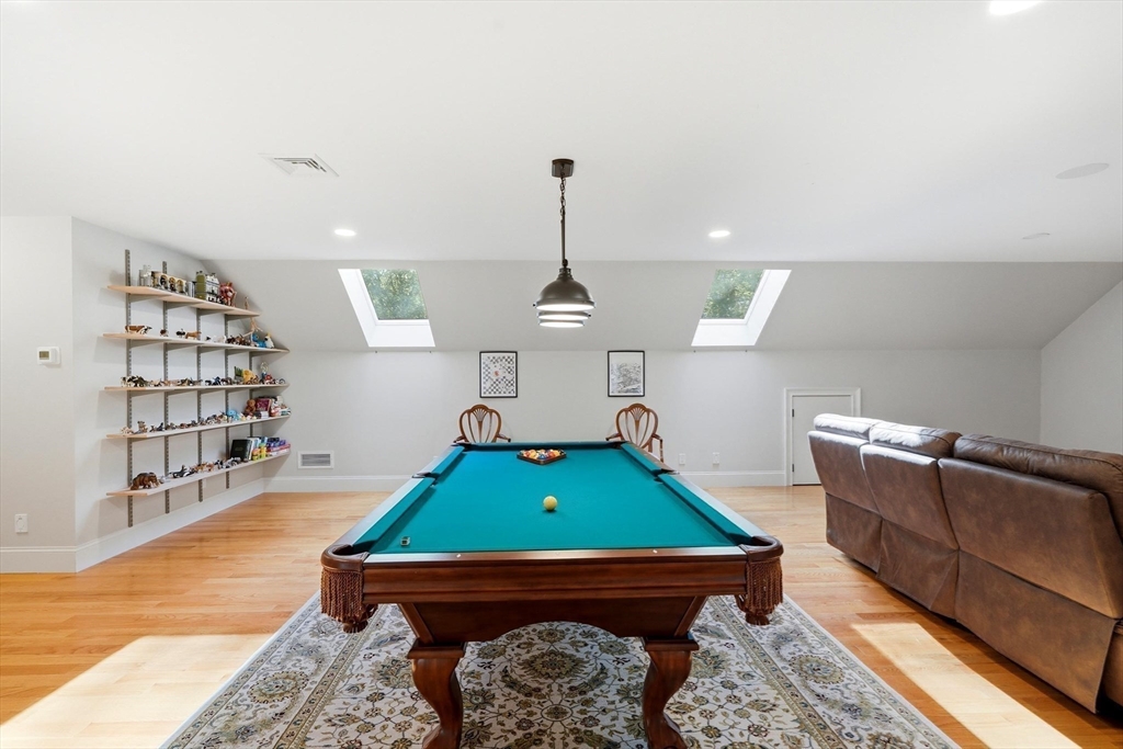 6 Flintlock Road Lexington, MA 02420 - Photo 31 of 39 a room with furniture pool table and window