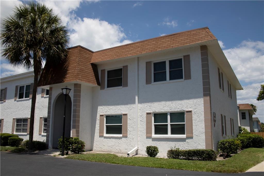 205 South McMullen Booth Road, Unit 203 Clearwater, FL 33759 - Photo 1 of 1 Building 18 Bottom right corner unit, Building freshly painted!