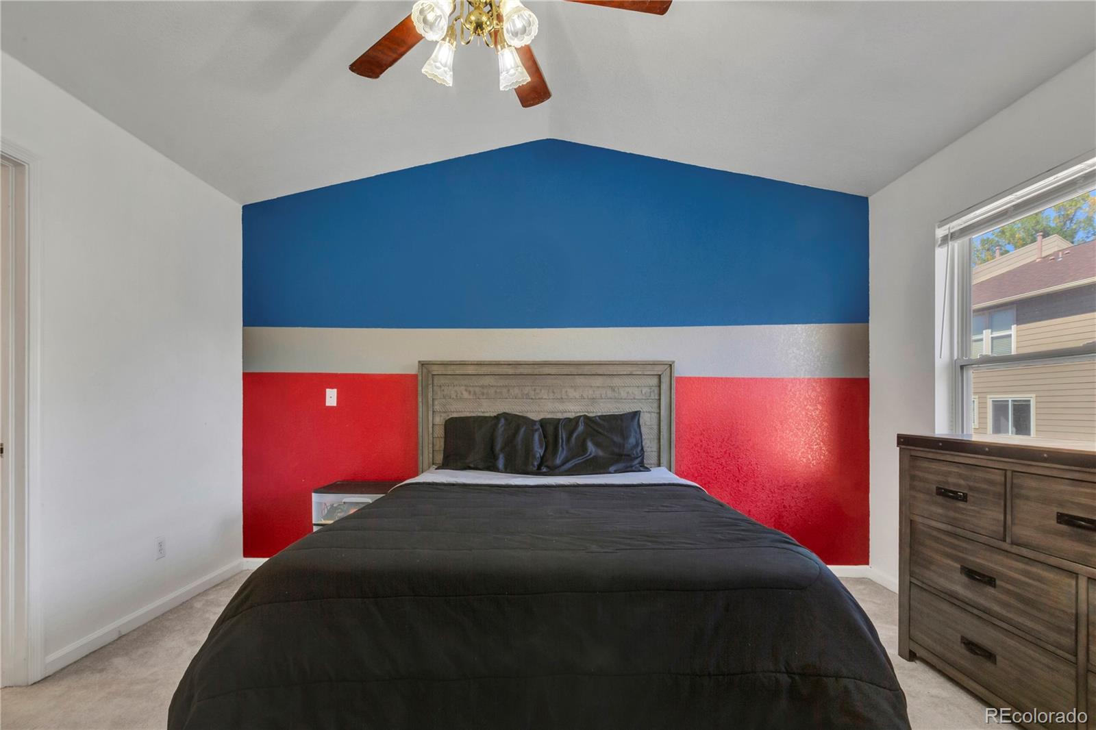 3300 West Florida Avenue, Unit 80 Denver, CO 80219 - Photo 15 of 24 a bedroom with a bed and a window