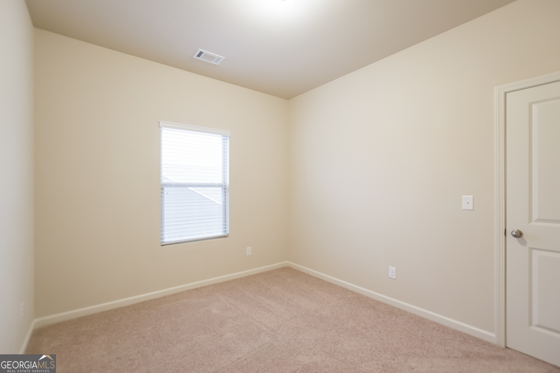 16 Sycamore Street Cartersville, GA 30120 - Photo 12 of 15 an empty room with a window