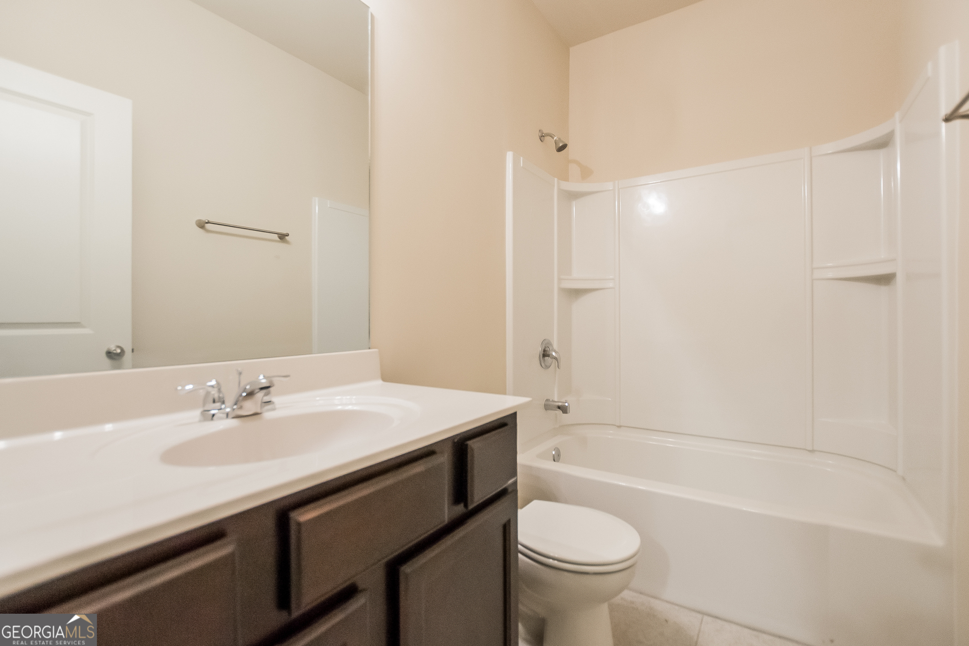 16 Sycamore Street Cartersville, GA 30120 - Photo 13 of 15 a bathroom with a sink a toilet and a bathtub