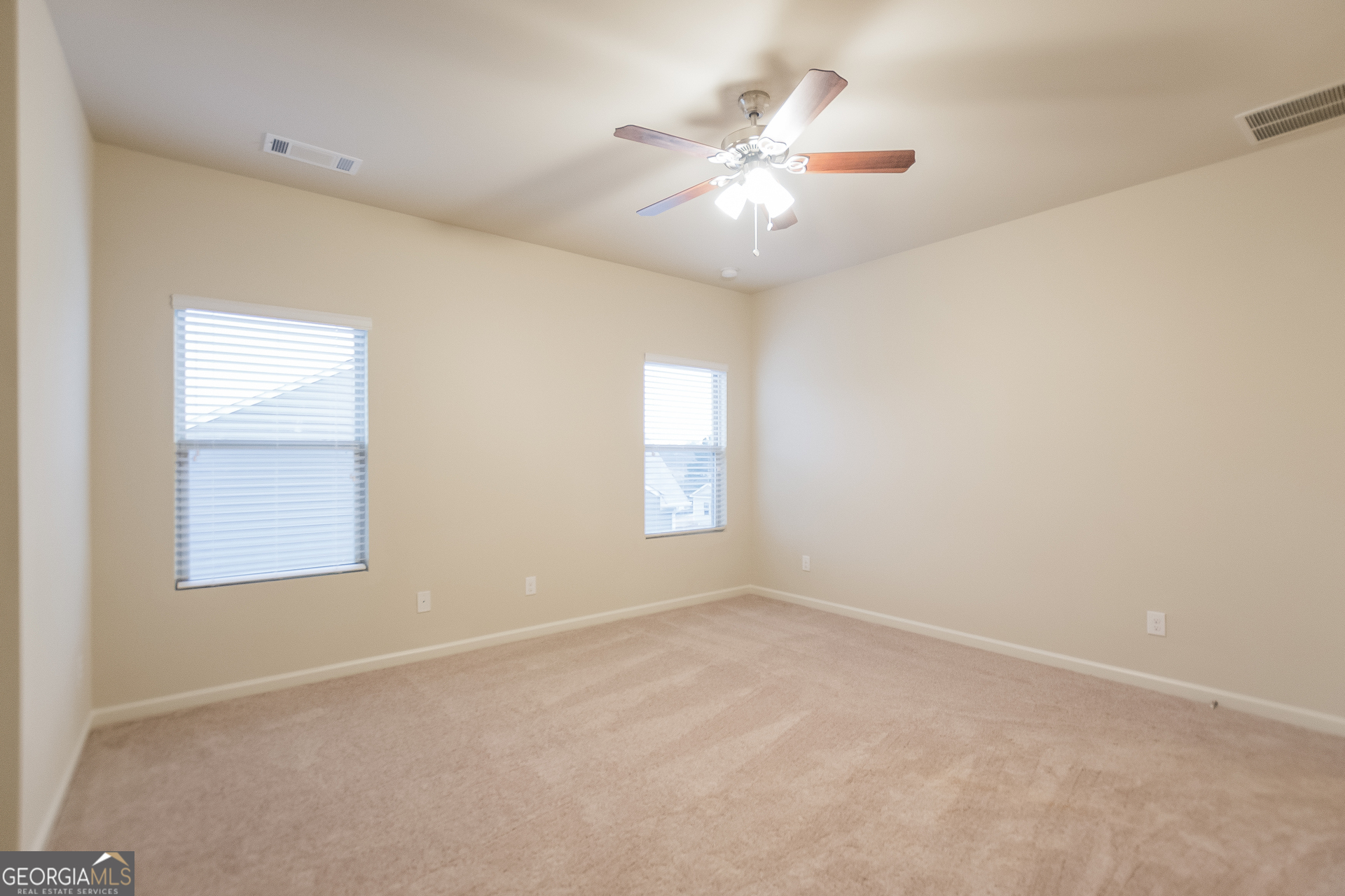 16 Sycamore Street Cartersville, GA 30120 - Photo 9 of 15 an empty room with windows