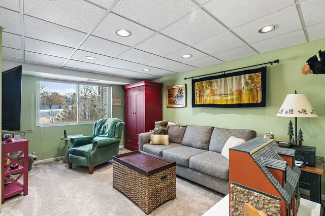 a kitchen with stainless steel appliances granite countertop a refrigerator and a stove