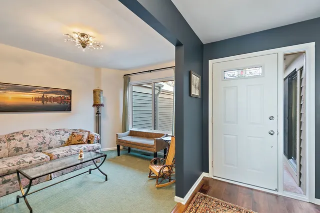 a bedroom with bed and a window