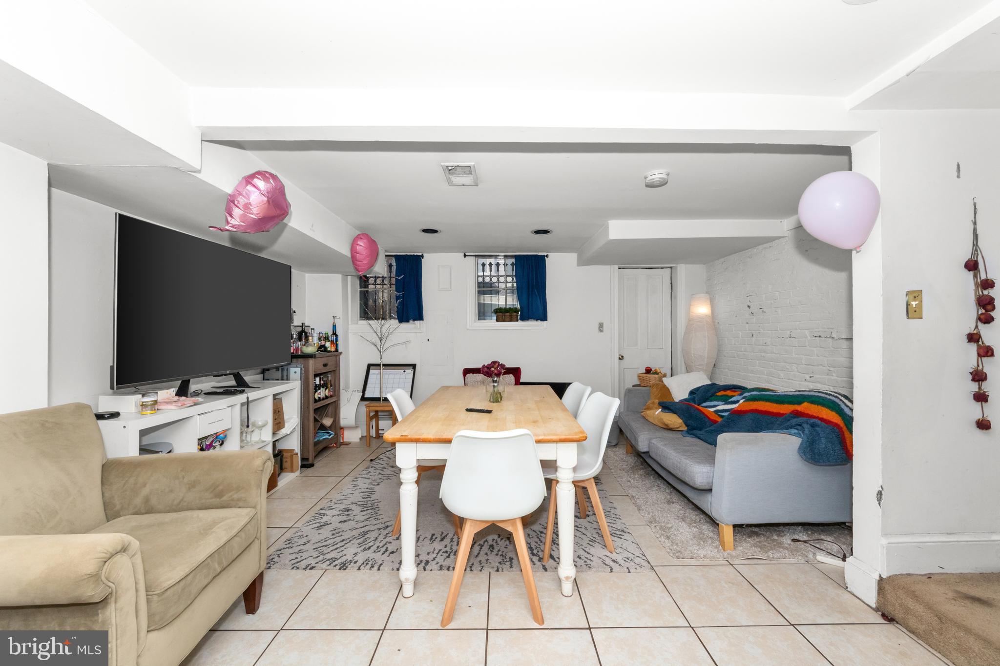 1013 Independence Avenue Southeast Washington, DC 20003 - Photo 11 of 35 a living room with furniture and kitchen view