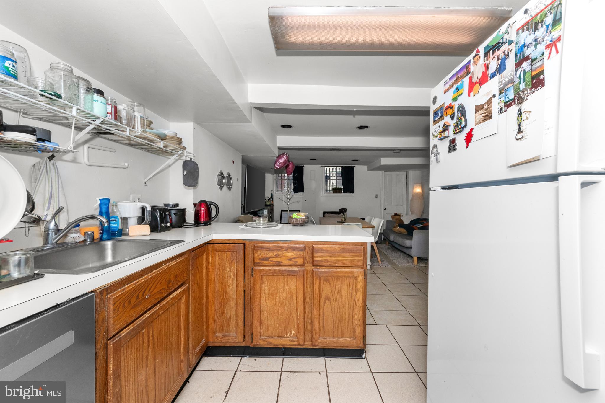 1013 Independence Avenue Southeast Washington, DC 20003 - Photo 13 of 35 a kitchen with stainless steel appliances granite countertop a sink and cabinets