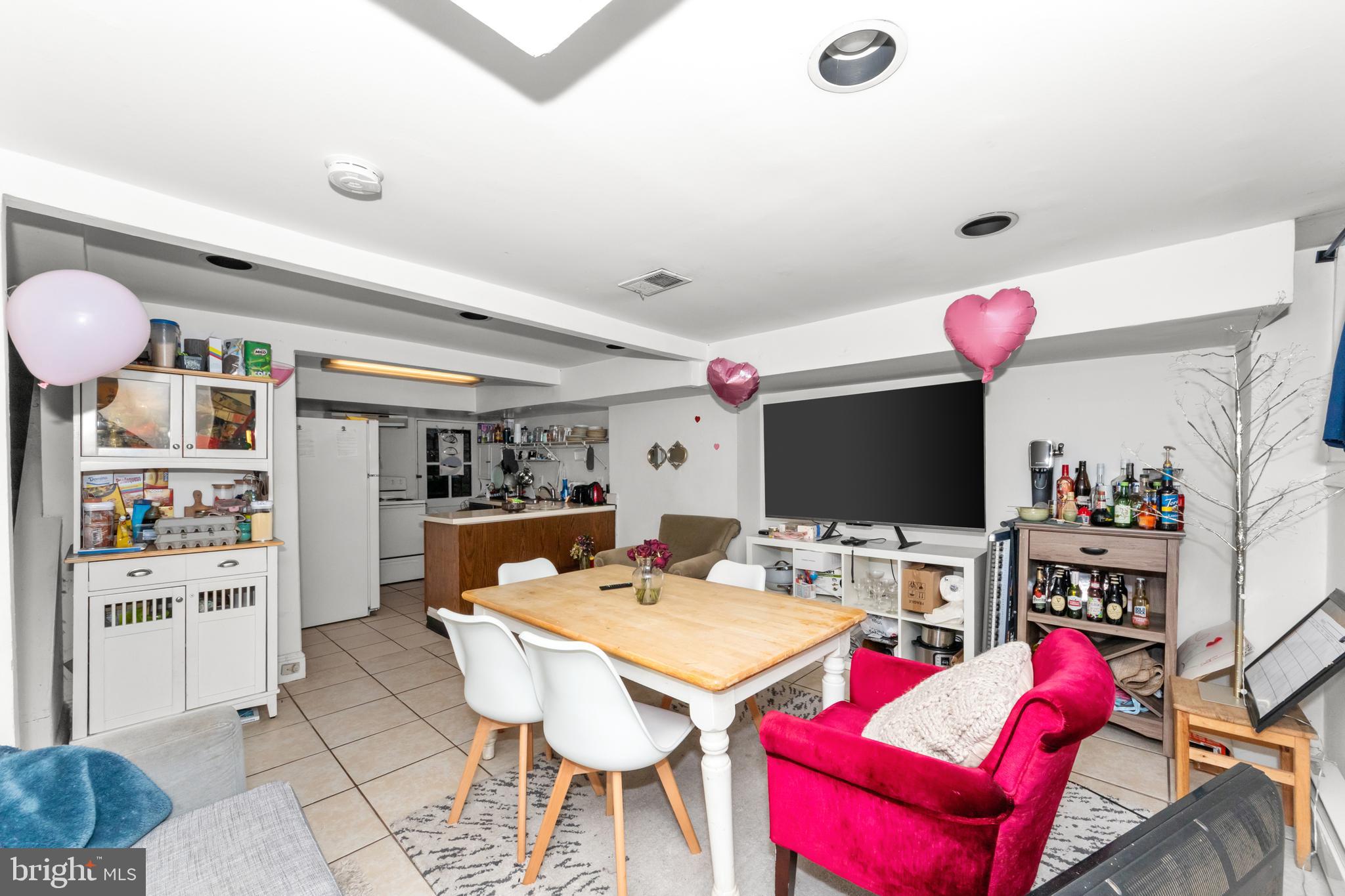 1013 Independence Avenue Southeast Washington, DC 20003 - Photo 15 of 35 a very nice looking room with a table and chairs