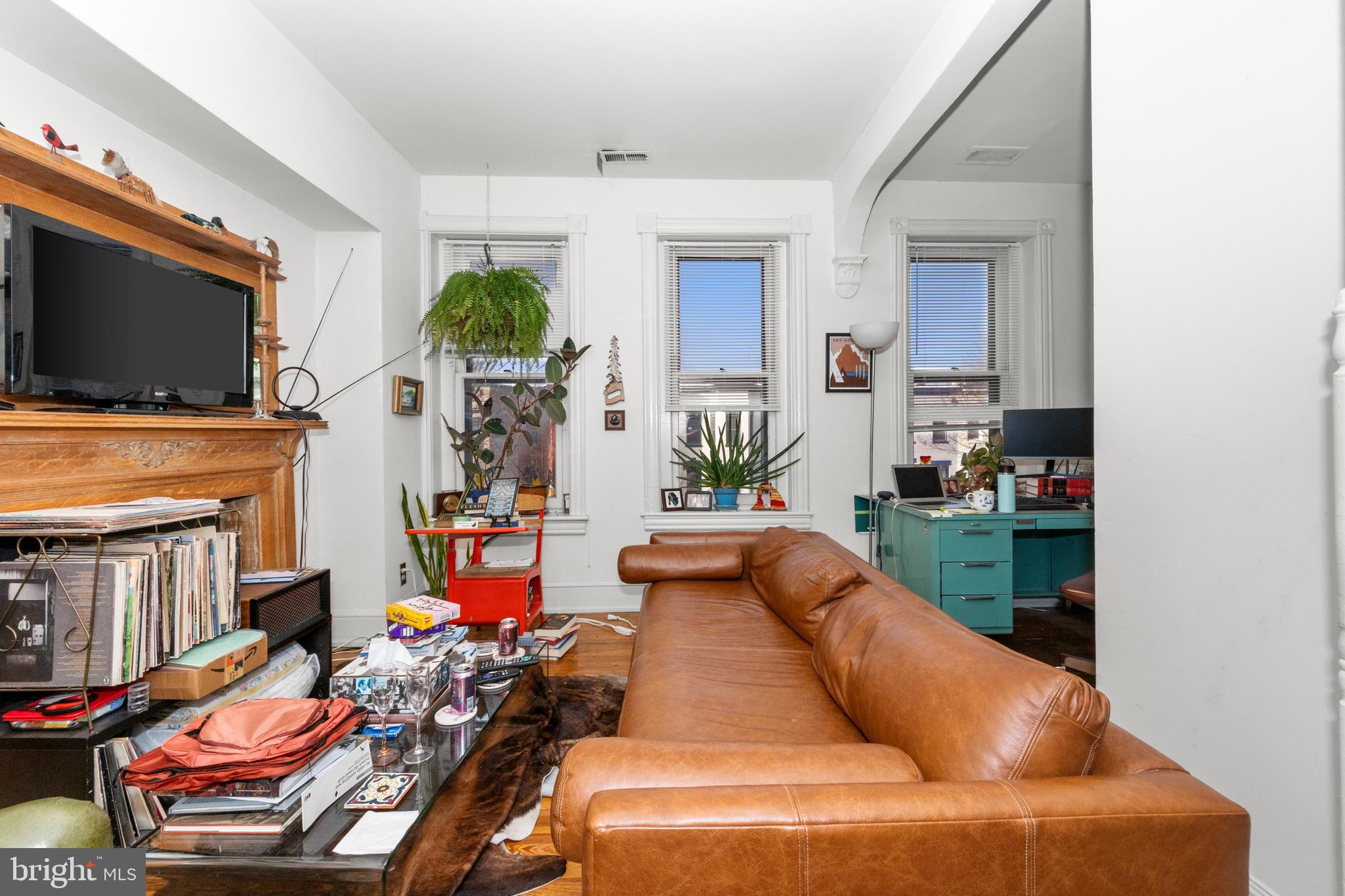 1013 Independence Avenue Southeast Washington, DC 20003 - Photo 19 of 35 a living room with fireplace furniture and a flat screen tv