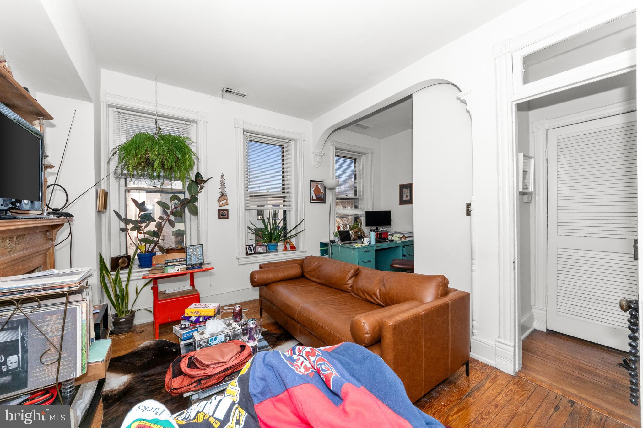 1013 Independence Avenue Southeast Washington, DC 20003 - Photo 20 of 35 a living room with furniture fireplace and flat screen tv