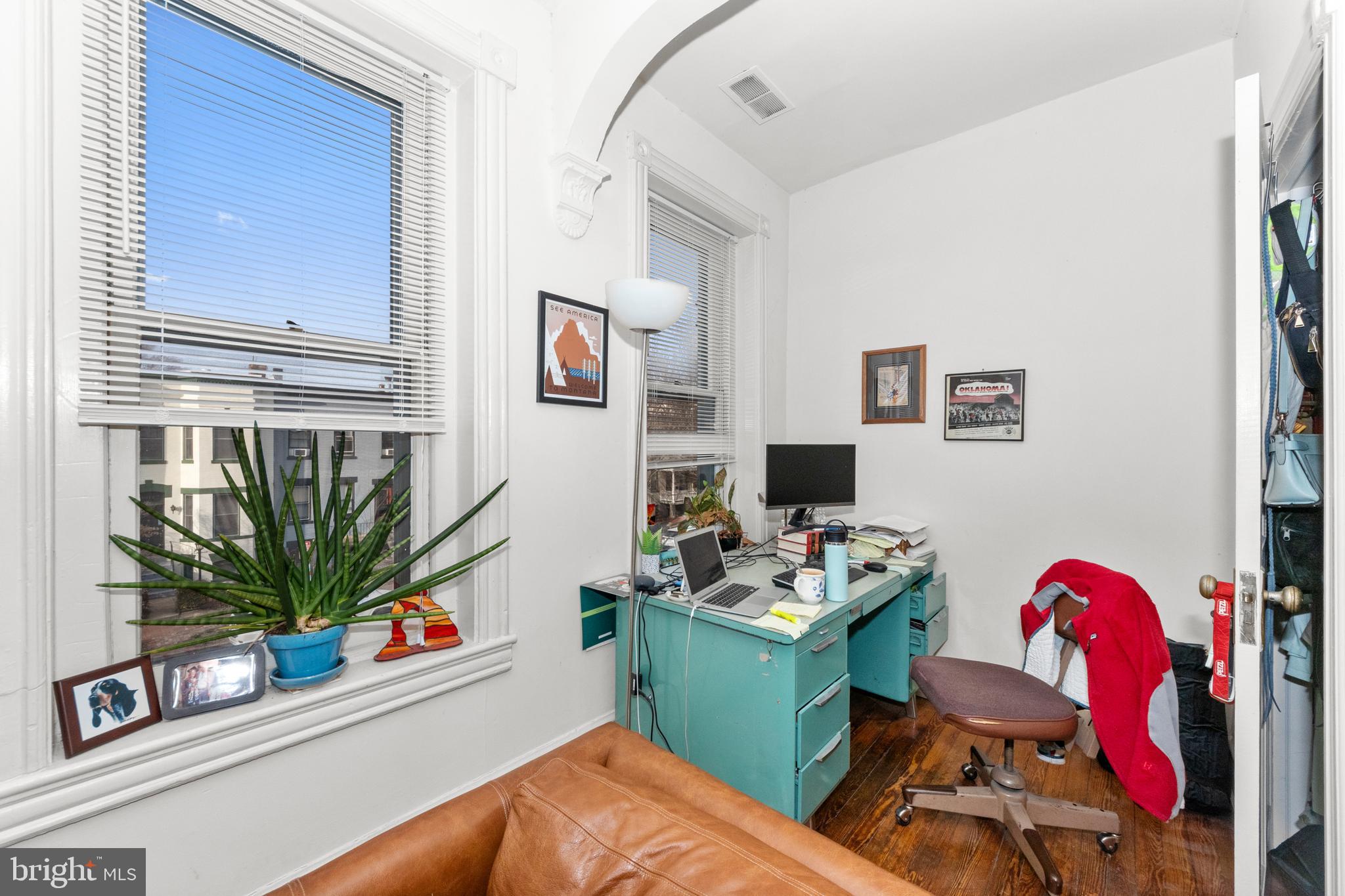 1013 Independence Avenue Southeast Washington, DC 20003 - Photo 21 of 35 a room with furniture and a potted plant