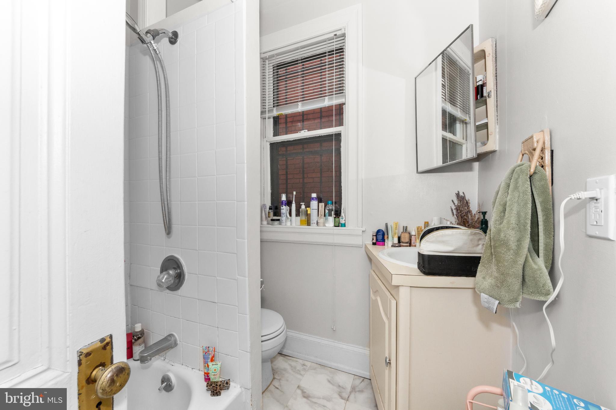 1013 Independence Avenue Southeast Washington, DC 20003 - Photo 22 of 35 a bathroom with a sink toilet and shower