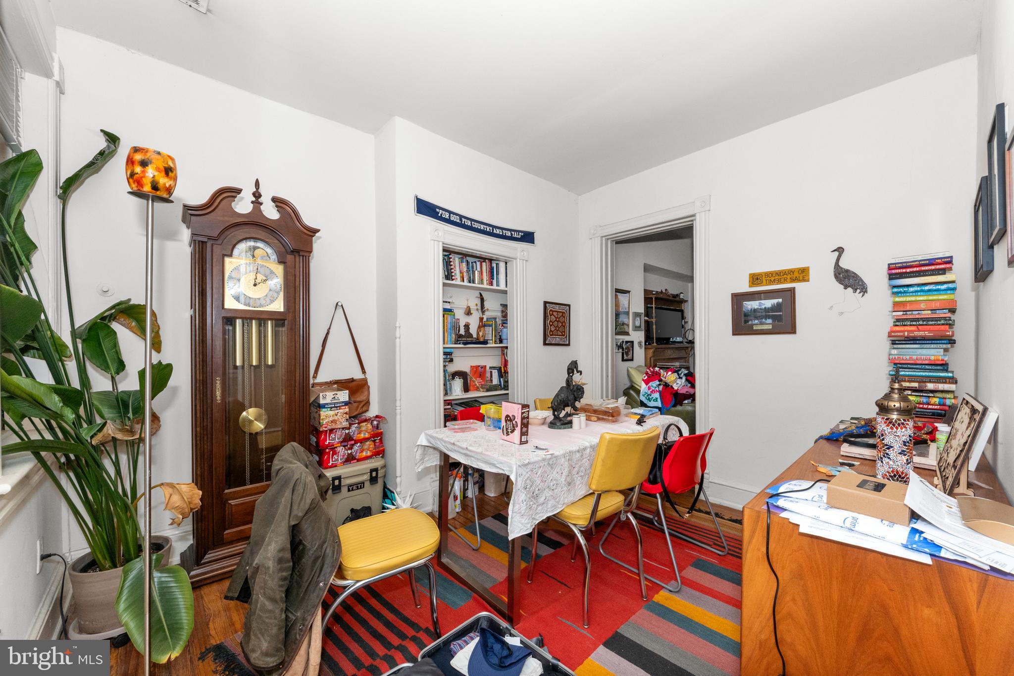 1013 Independence Avenue Southeast Washington, DC 20003 - Photo 24 of 35 a living room with furniture a potted plant and a wooden floor