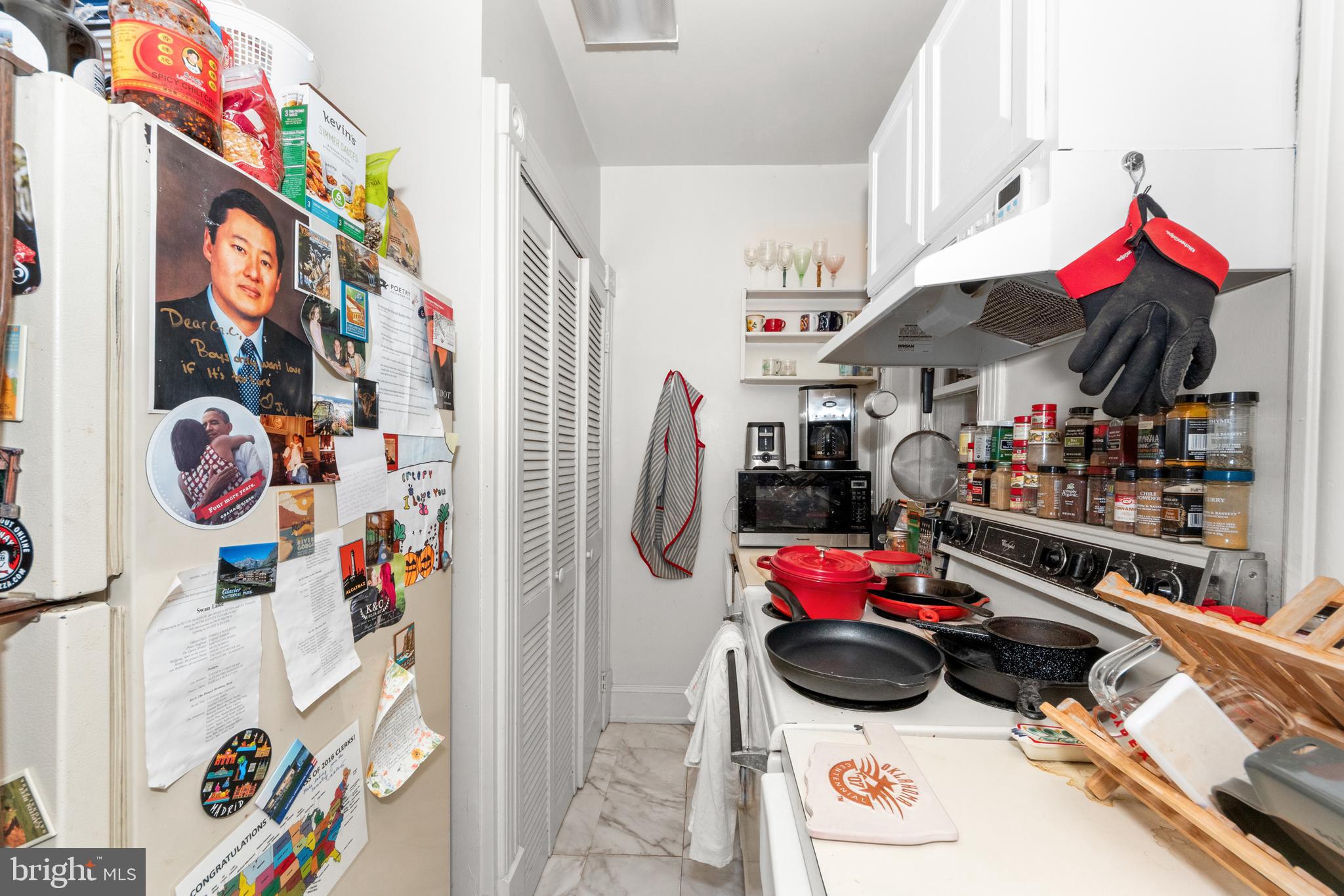 1013 Independence Avenue Southeast Washington, DC 20003 - Photo 25 of 35 a utility room with lots of different colored cloths