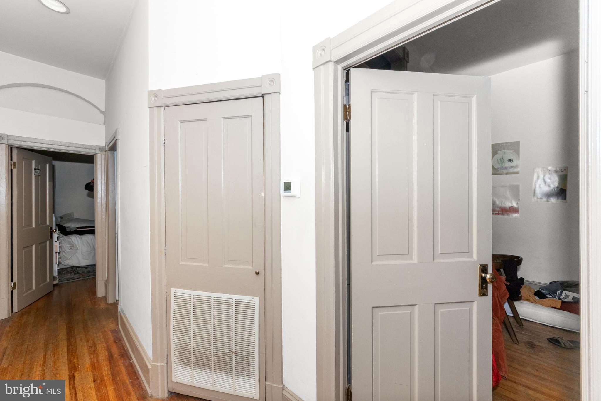 1013 Independence Avenue Southeast Washington, DC 20003 - Photo 5 of 35 a view of a hallway with bathroom and wooden floor