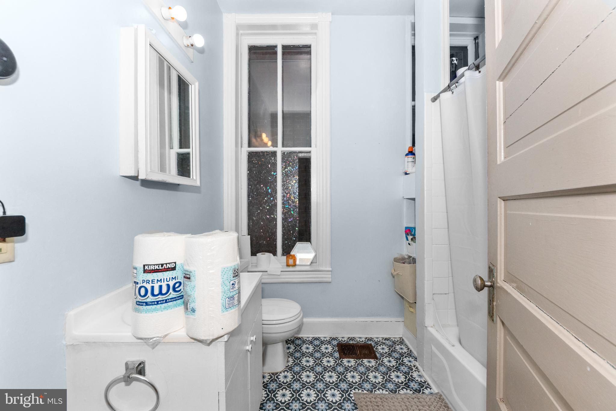 1013 Independence Avenue Southeast Washington, DC 20003 - Photo 8 of 35 a bathroom with a shower a toilet and sink