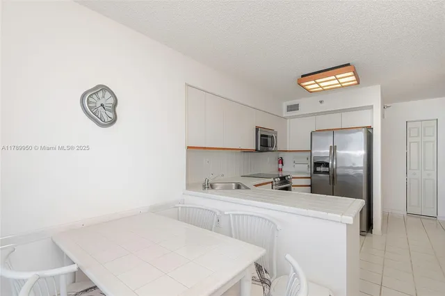 $599,000 | 3530 Mystic Pointe Drive, Unit LPH14, Aventura, FL 33180