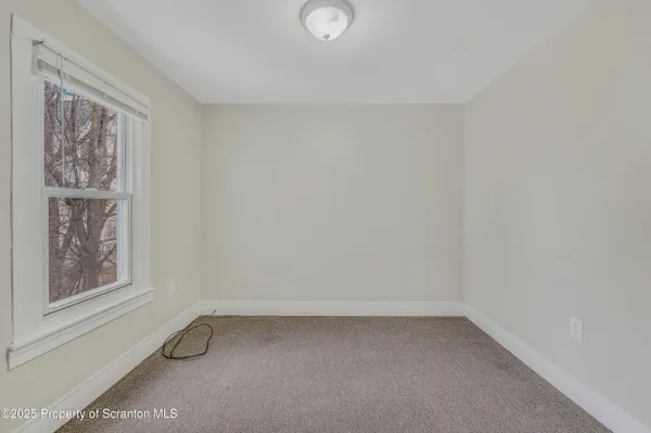 a view of a small space with a window