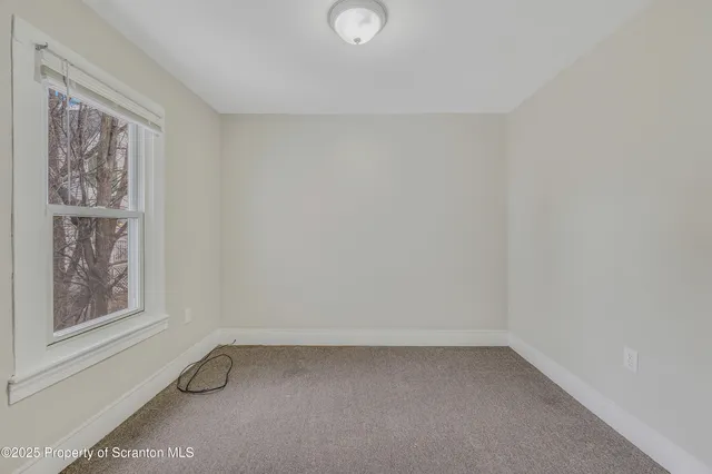 a view of a small space with a window