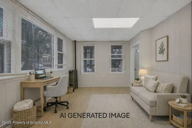 a living room with furniture and a window