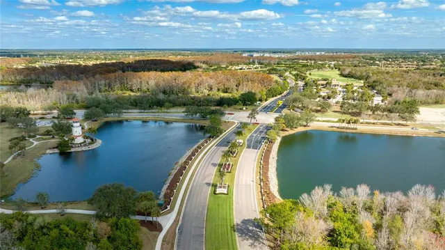 an aerial view of a house with a ocean view