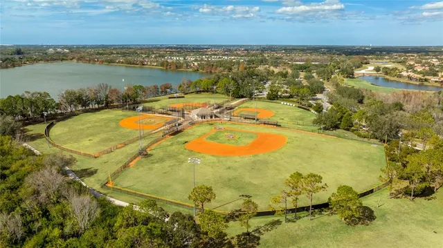 a view of a swimming pool with a lake view