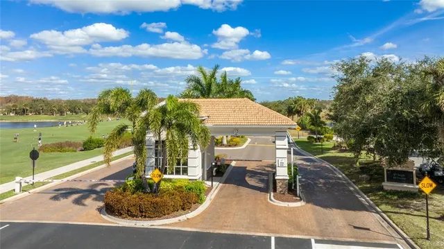 a view of a swimming pool with a backyard