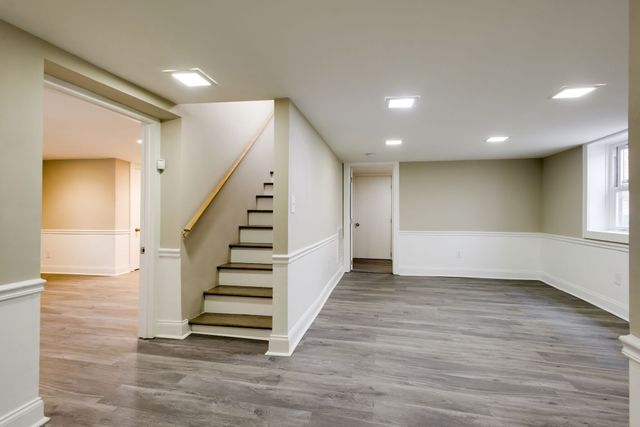 a view of entryway with wooden floor