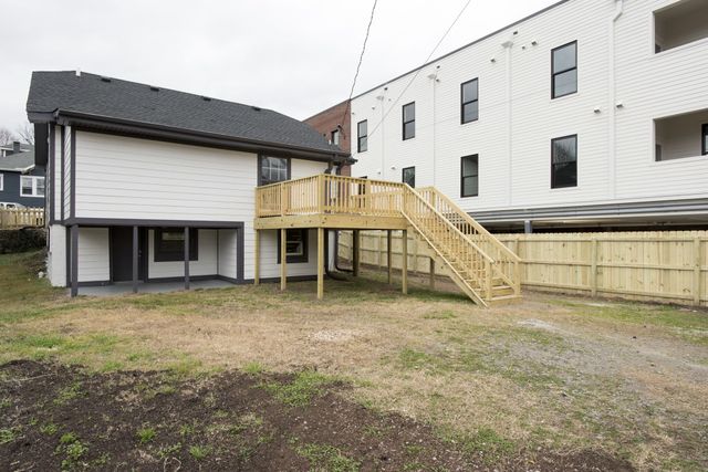 a view of a house with a large window