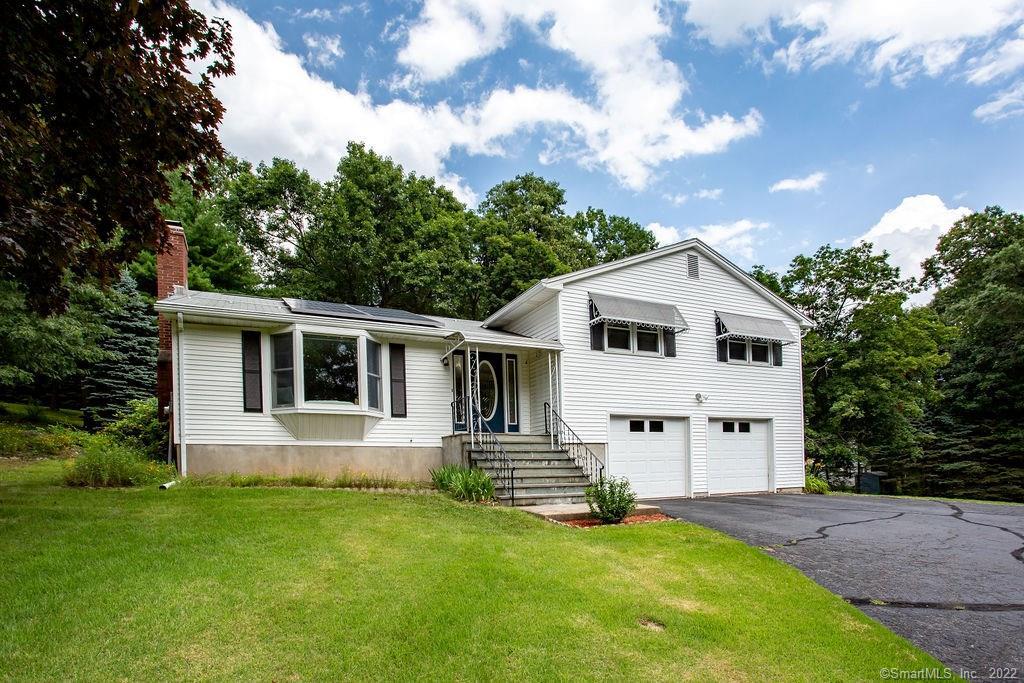 591 Neipsic Road Glastonbury, CT 06033 - Photo 1 of 1 a view of a house with a yard