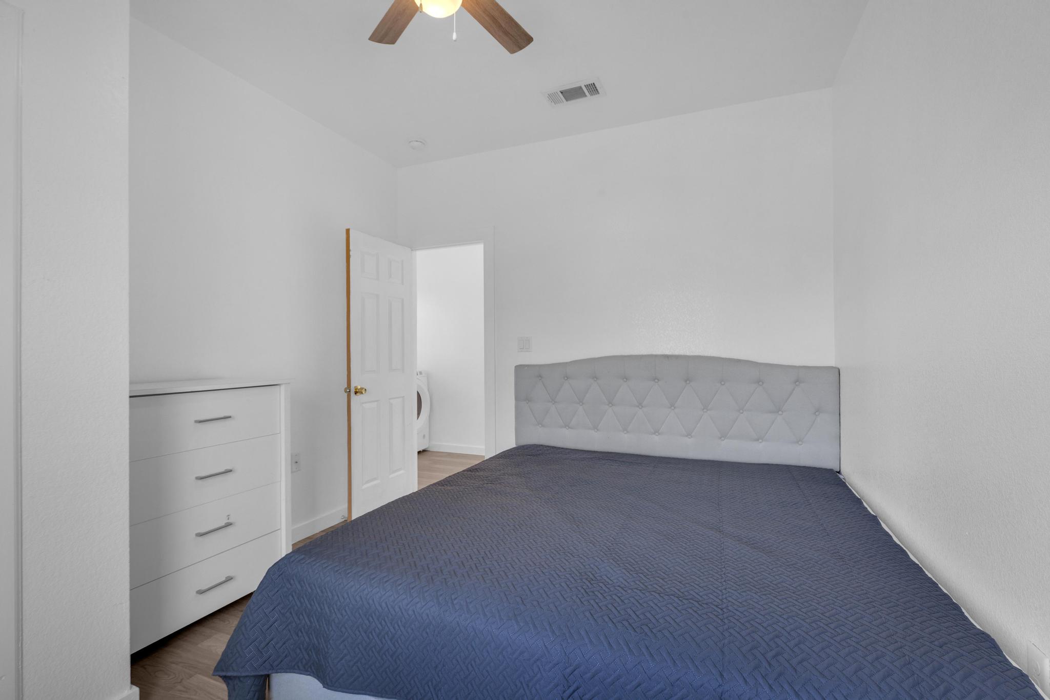 114 Crepe Myrtle Parkway Elgin, TX 78621 - Photo 11 of 40 a view of an empty room and chandelier fan