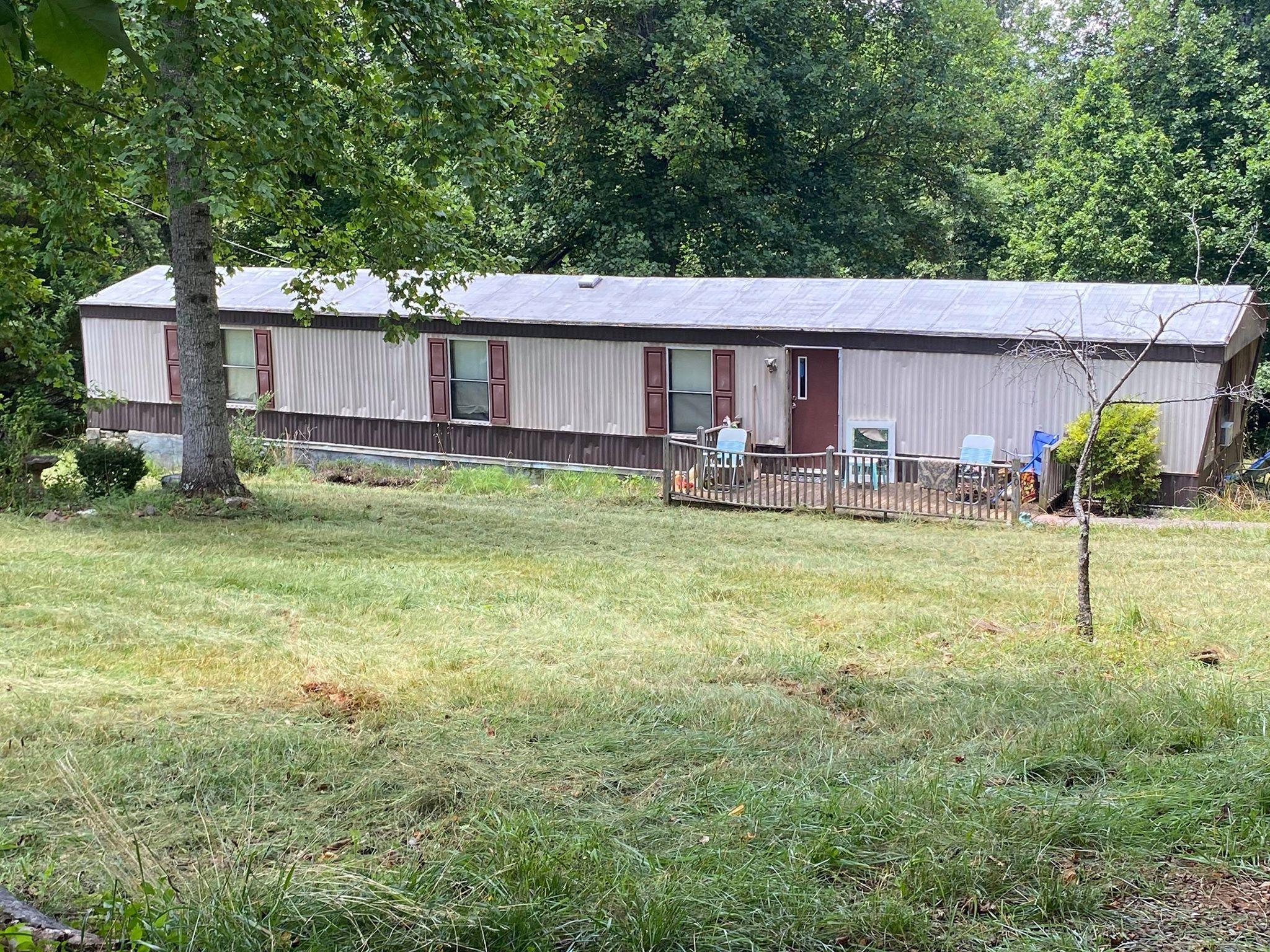 20 Tolley Road Hardy, VA 24101 - Photo 6 of 12 a house view with a sitting space and garden