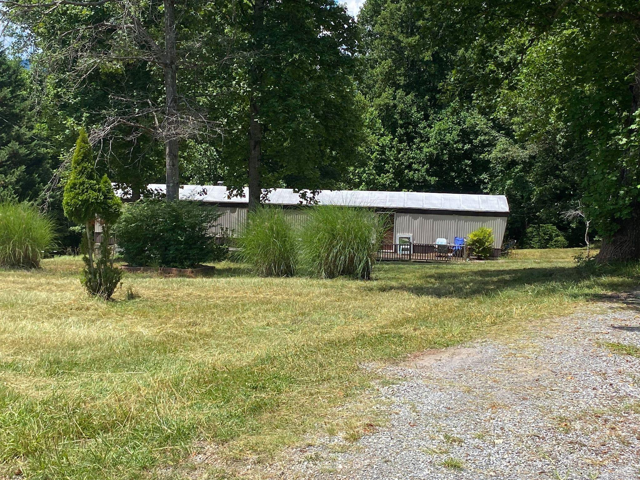 20 Tolley Road Hardy, VA 24101 - Photo 7 of 12 a front view of a house with a yard