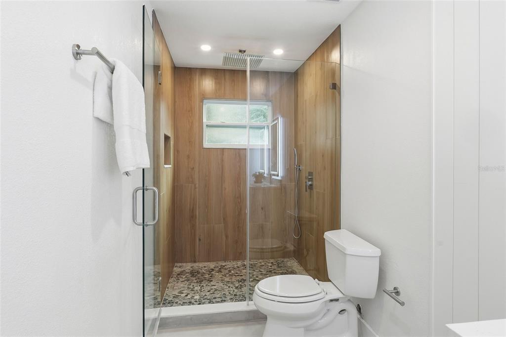 404 Bryan Oak Avenue Brandon, FL 33511 - Photo 20 of 43 a bathroom with a shower a toilet and a sink