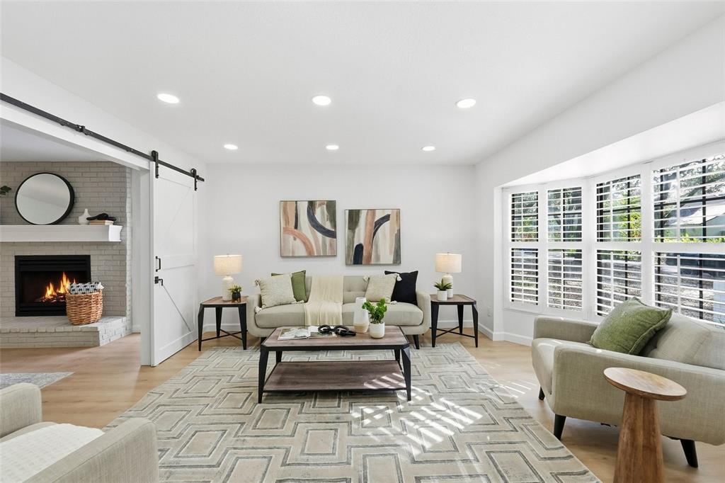 404 Bryan Oak Avenue Brandon, FL 33511 - Photo 2 of 43 a living room with furniture and a fireplace