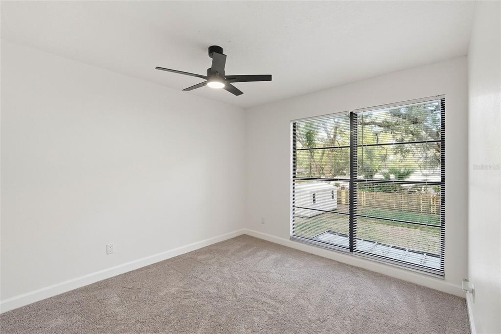 404 Bryan Oak Avenue Brandon, FL 33511 - Photo 28 of 43 a view of room with window and ceiling fan