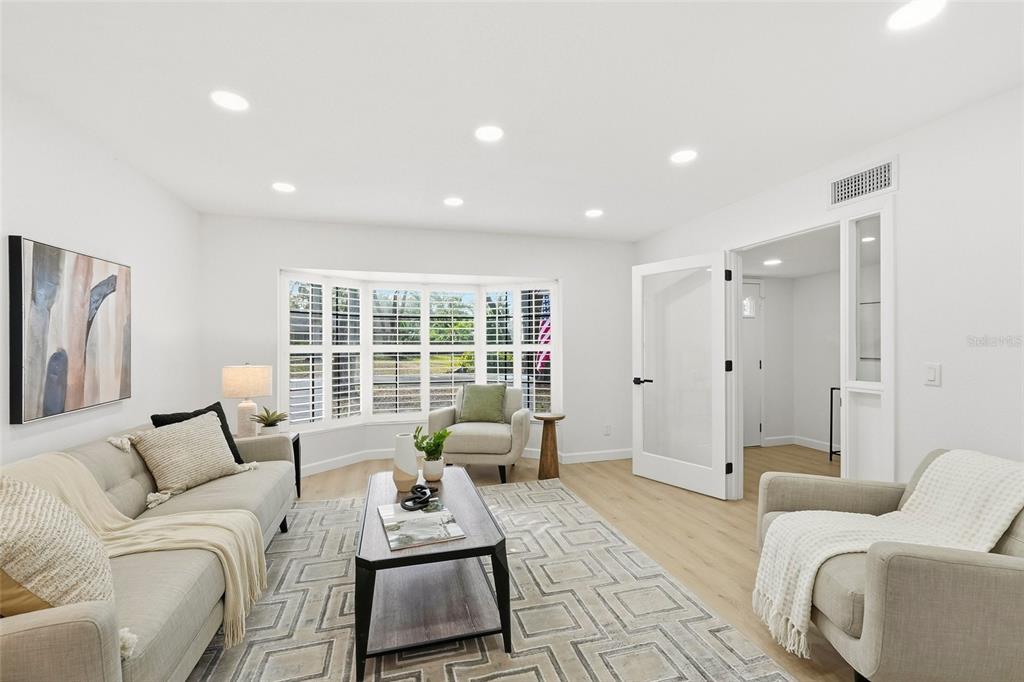 404 Bryan Oak Avenue Brandon, FL 33511 - Photo 3 of 43 a living room with furniture and a large window