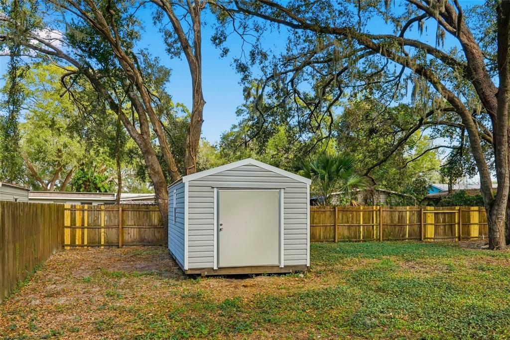 404 Bryan Oak Avenue Brandon, FL 33511 - Photo 35 of 43 a front view of a house with a yard