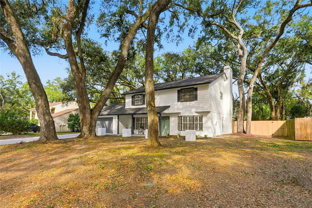 404 Bryan Oak Avenue Brandon, FL 33511 - Photo 39 of 43 a front view of a house with a yard