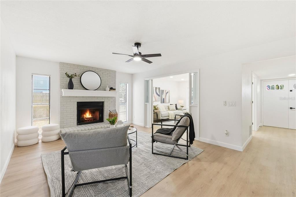 404 Bryan Oak Avenue Brandon, FL 33511 - Photo 6 of 43 a living room with furniture and a fireplace