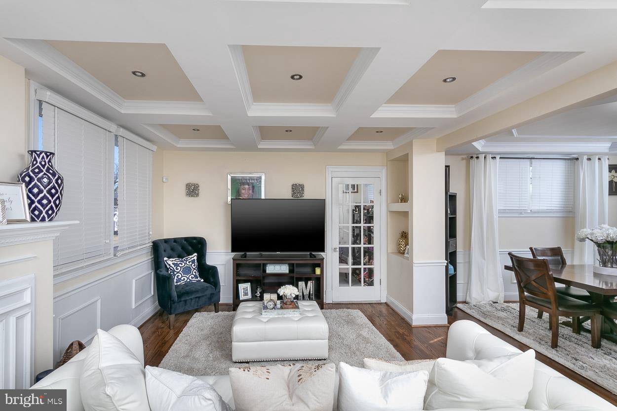 7217 Old Harford Road Baltimore, MD 21234 - Photo 9 of 33 Living room with fireplace and coffered ceiling