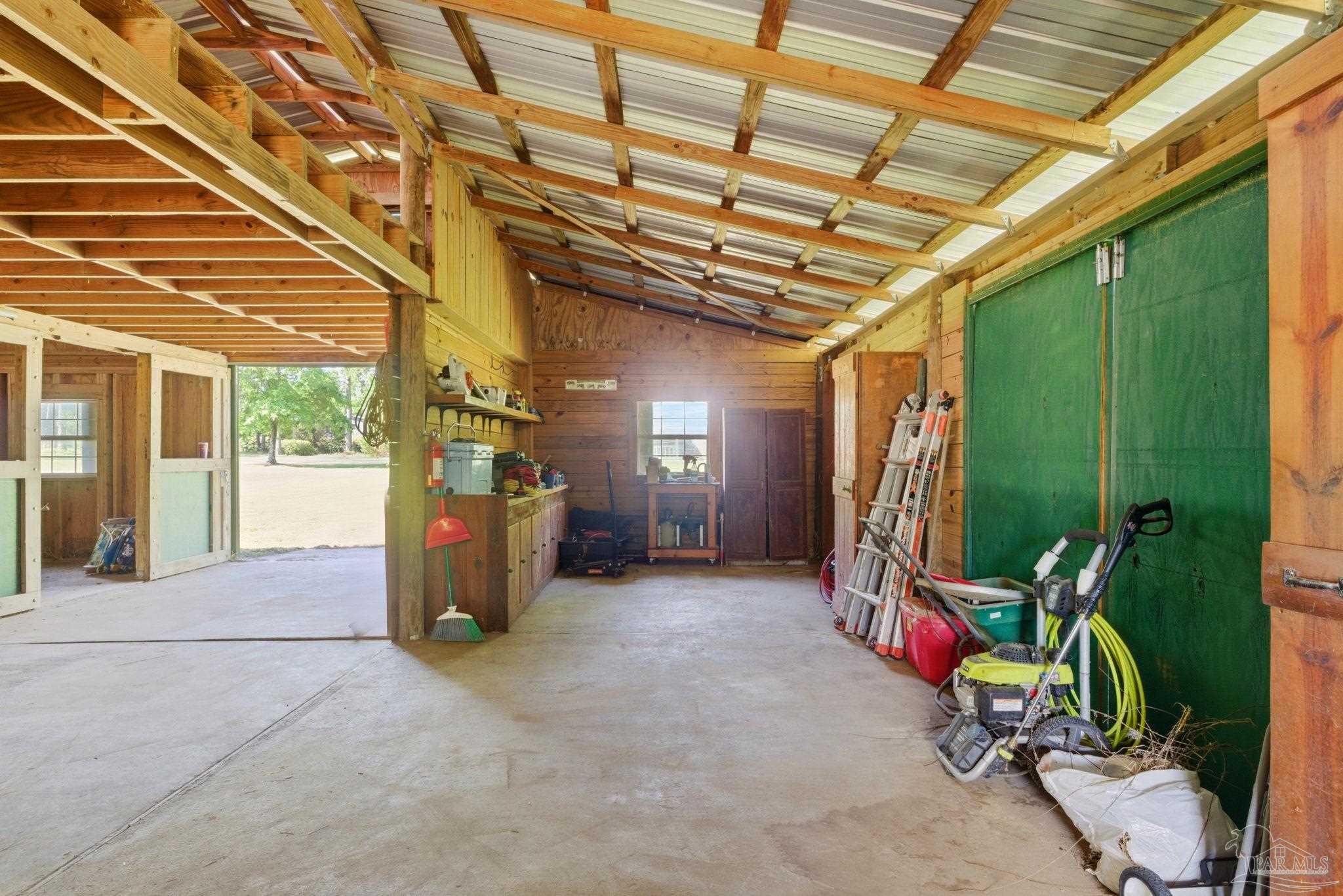6870 Martin Road Milton, FL 32570 - Photo 42 of 48 a view of a room with gym equipment