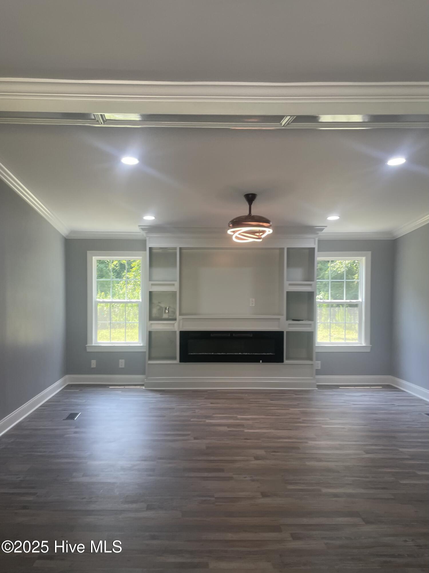 234 Bullard Road Chadbourn, NC 28431 - Photo 20 of 85 Electric fireplace with built in shelving and entertainment center