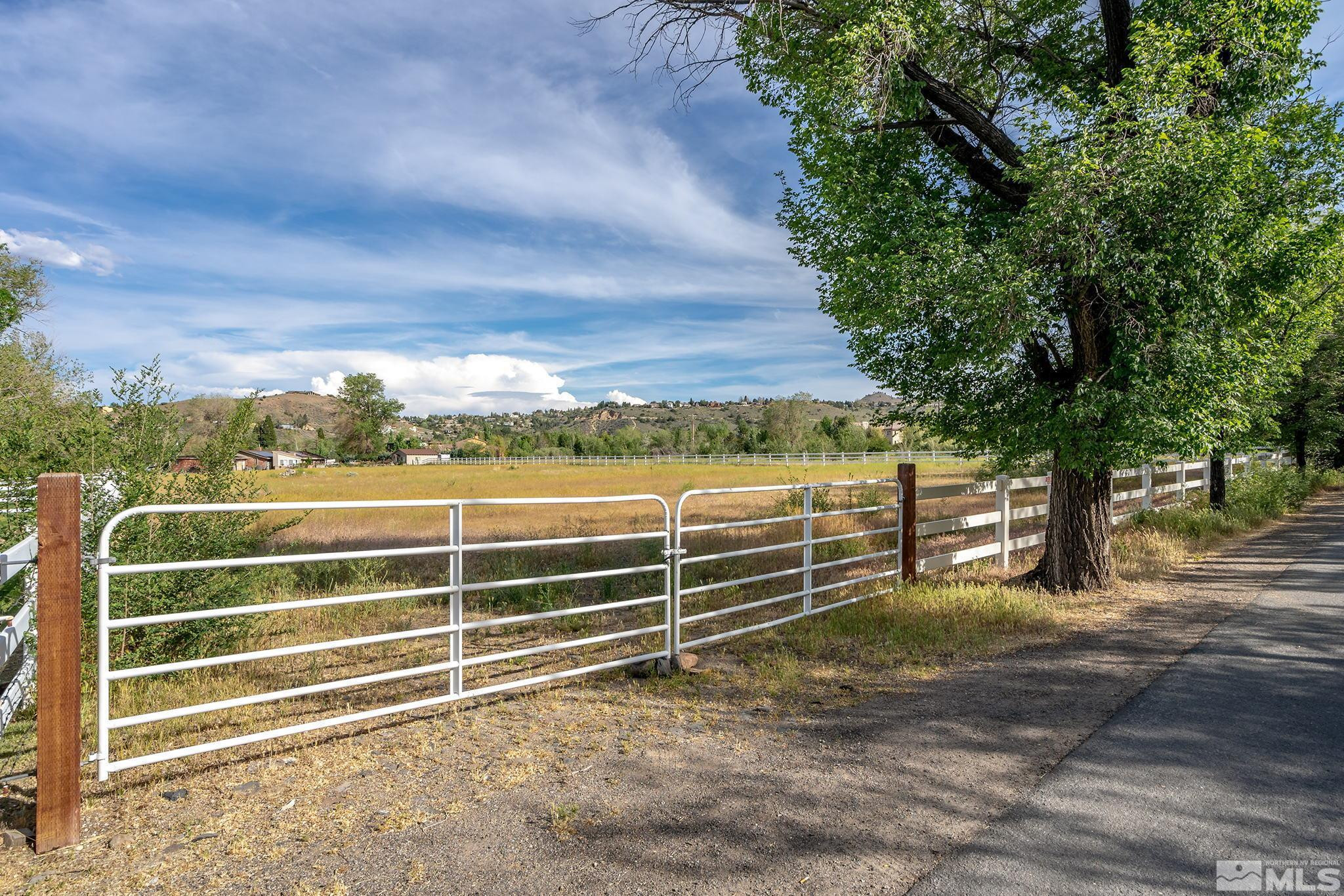 160 Juniper Hill Road Reno, NV 89519 - Photo 3 of 11 a view of a yard with wooden fence