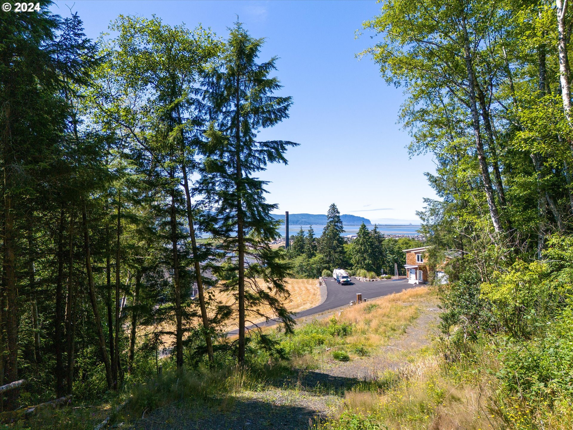 Franklin Street Garibaldi, OR 97118 - Photo 5 of 11 a view of a lake with houses