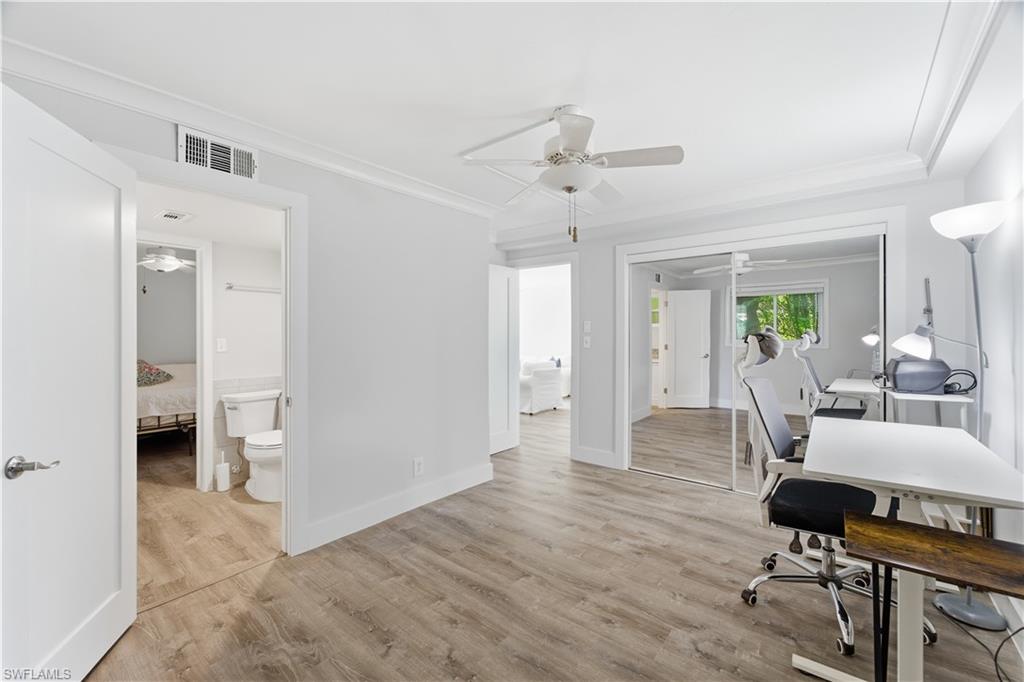 975 9th Avenue South, Unit 11 Naples, FL 34102 - Photo 10 of 19 a view of a livingroom with furniture and a window