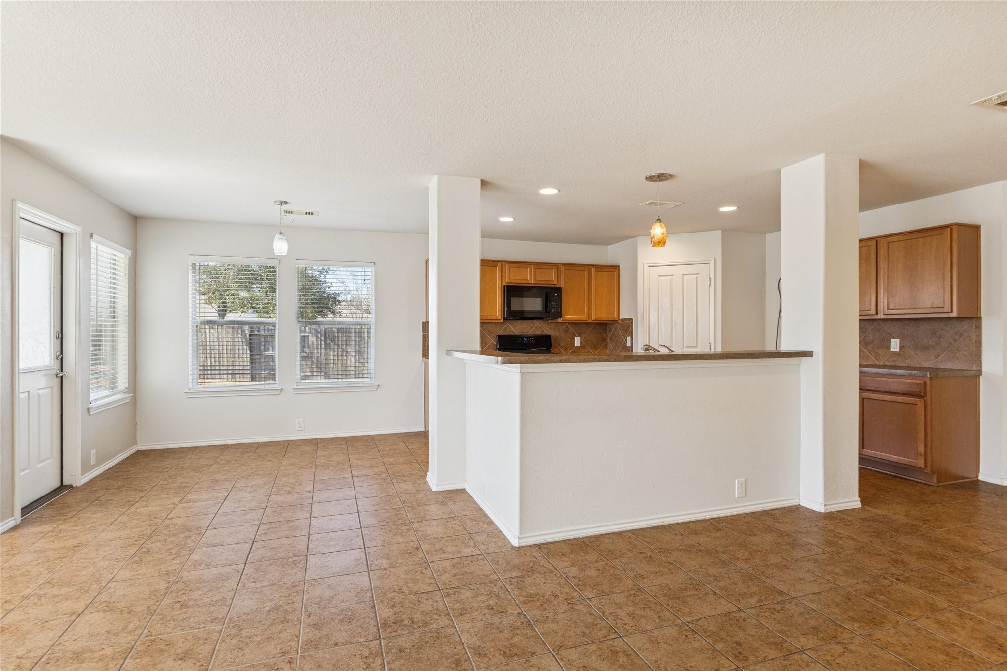 1034 Clover Leaf Court Rosenberg, TX 77469 - Photo 11 of 21 a view of large kitchen with a sink and a refrigerator