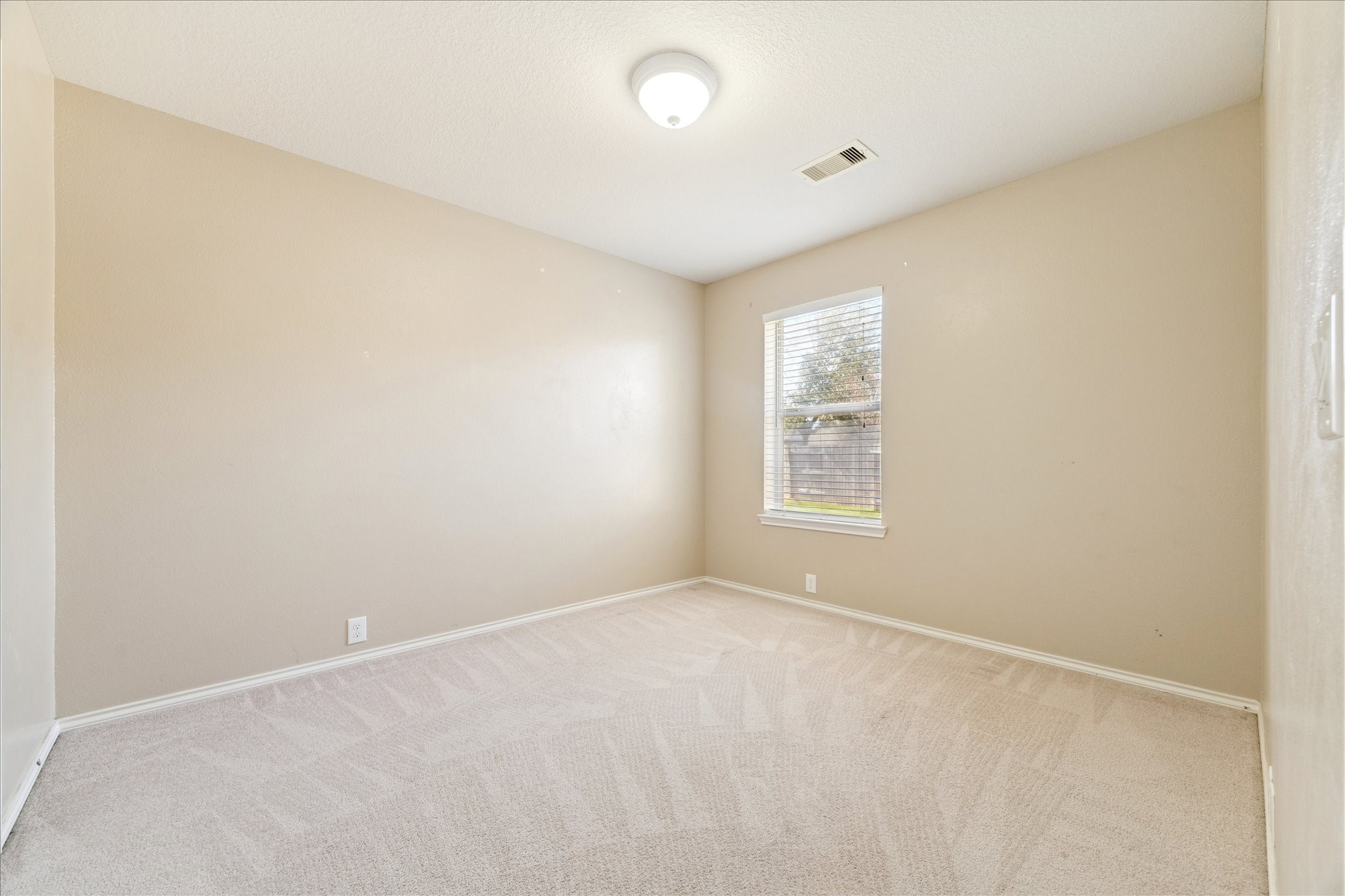 1034 Clover Leaf Court Rosenberg, TX 77469 - Photo 16 of 21 an empty room with windows